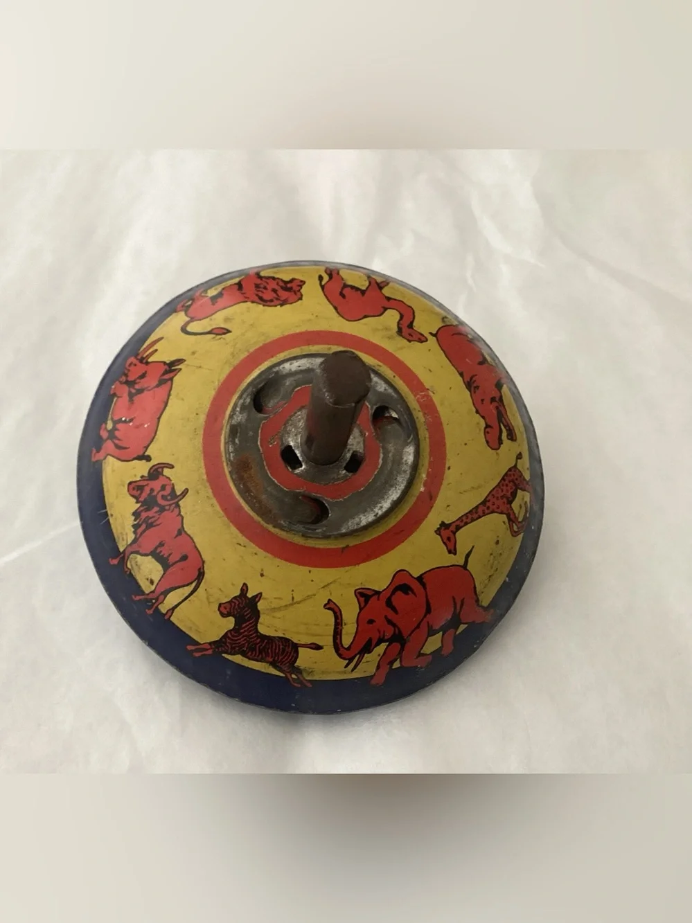 Vtg. Ohio Art Tin Lithographed Spinning toy top.  Design of zoo animals